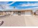 Charming single-story home featuring a low-maintenance front yard and attached one car garage at 7546 E Clovis Cir, Mesa, AZ 85208