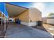 Exterior of home showing carport, HVAC, and landscaping at 806 W Summerside Rd, Phoenix, AZ 85041