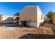 Backside exterior of home featuring HVAC and low maintenance rock landscaping at 806 W Summerside Rd, Phoenix, AZ 85041