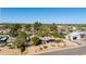 Aerial view of the property showcasing the home's placement and surrounding greenery at 11416 N 66Th St, Scottsdale, AZ 85254