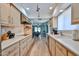 Bright kitchen features lots of wood cabinets, stainless appliances and an open design at 12834 W Ashwood Dr, Sun City West, AZ 85375
