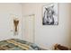 Minimalist bedroom with modern art, patterned bedding, and closet at 12873 N 175Th Dr, Surprise, AZ 85388