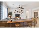 Open-concept living room with a bar-height counter, perfect for entertaining and casual dining at 12873 N 175Th Dr, Surprise, AZ 85388