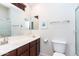 Modern bathroom features a large mirror, vanity with a sink, and a glass-enclosed shower at 1350 S Greenfield Rd # 1016, Mesa, AZ 85206