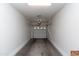 Clean and well-lit two-car garage featuring ample space for storage, with a garage door at 1350 S Greenfield Rd # 1016, Mesa, AZ 85206