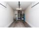 Spacious two-car garage with ample room for storage, water heater, and garage door opener at 1350 S Greenfield Rd # 1016, Mesa, AZ 85206