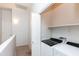 Bright laundry room features a washer, dryer, and built in shelving with easy access at 1350 S Greenfield Rd # 1016, Mesa, AZ 85206
