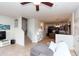 Inviting living room featuring an open floor plan and staircase to the second floor at 1350 S Greenfield Rd # 1016, Mesa, AZ 85206
