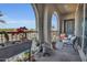 Charming balcony with comfortable seating, potted plants, and scenic views at 155 N Lakeview Blvd # 206, Chandler, AZ 85225
