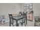 Cozy dining area perfect for Gathering meals, featuring a stylish table and wall decor at 155 N Lakeview Blvd # 206, Chandler, AZ 85225