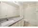 Bright bathroom featuring granite counters, a modern sink, and shower/tub combo at 18153 W Fulton St, Goodyear, AZ 85338