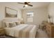 Cozy bedroom featuring a comfortable bed, soft lighting, and a serene atmosphere at 18153 W Fulton St, Goodyear, AZ 85338