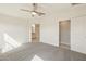 Spacious main bedroom with carpet floors and ensuite bathroom access at 18153 W Fulton St, Goodyear, AZ 85338