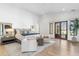 Spacious primary bedroom with sitting area and bright natural light at 19494 N 98Th Pl, Scottsdale, AZ 85255