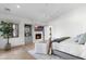 Primary bedroom featuring a fireplace, TV and stylish decor at 19494 N 98Th Pl, Scottsdale, AZ 85255