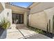 Landscaped courtyard features travertine floors, a water feature, and desert plants at 19494 N 98Th Pl, Scottsdale, AZ 85255