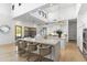 Gourmet kitchen with island seating, custom cabinetry, and modern appliances at 19494 N 98Th Pl, Scottsdale, AZ 85255