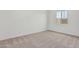 Carpeted bedroom featuring a window and neutral walls, creating a cozy atmosphere at 20624 S 216Th Pl, Queen Creek, AZ 85142