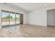 Spacious living area with sliding glass doors that provide access to the backyard at 20624 S 216Th Pl, Queen Creek, AZ 85142
