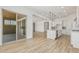 Open-concept living area with a kitchen, and sliding glass doors to the backyard at 20624 S 216Th Pl, Queen Creek, AZ 85142