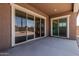 Covered patio featuring sliding glass doors with access to the home's interior at 20624 S 216Th Pl, Queen Creek, AZ 85142