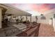 Inviting backyard featuring a covered patio, desert landscaping, and privacy wall for outdoor enjoyment at 2506 S Acanthus --, Mesa, AZ 85209
