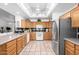 Bright kitchen with stainless steel appliances, tile floors, and granite countertops at 2506 S Acanthus --, Mesa, AZ 85209
