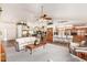 Spacious living room features an open layout with a large seating area and a ceiling fan at 2506 S Acanthus --, Mesa, AZ 85209