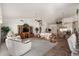 Open living room with vaulted ceilings, neutral tones, and comfortable seating arrangements at 2506 S Acanthus --, Mesa, AZ 85209