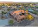 Stunning aerial view of custom home with mature landscaping in a tranquil desert community at 29423 N 145Th Pl, Scottsdale, AZ 85262