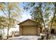 Inviting home featuring a two-car garage, neutral paint, and low maintenance desert landscaping at 40247 W Helen Ct, Maricopa, AZ 85138