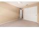 Neutral-toned bedroom with plush carpet and a sliding door closet at 4102 E Cathedral Rock Dr, Phoenix, AZ 85044