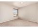 Cozy bedroom with a ceiling fan, carpet floors, and a window with blinds at 4102 E Cathedral Rock Dr, Phoenix, AZ 85044