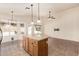 Open-concept kitchen and living area with an island and stainless steel appliances at 4102 E Cathedral Rock Dr, Phoenix, AZ 85044
