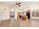 Bright open kitchen featuring a center island, modern appliances, and tile flooring at 4102 E Cathedral Rock Dr, Phoenix, AZ 85044