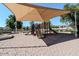 Community playground with slides and climbing structures, shaded by a canopy for safe outdoor play at 4102 E Cathedral Rock Dr, Phoenix, AZ 85044
