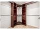Spacious walk-in closet with custom built-in shelving and drawers for optimal organization at 4102 E Cathedral Rock Dr, Phoenix, AZ 85044