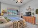Bright bedroom featuring a large window and neutral decor at 4241 N Pebble Creek Pkwy # 42, Goodyear, AZ 85395