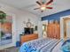 Spacious bedroom with ensuite access and a comfortable bed at 4241 N Pebble Creek Pkwy # 42, Goodyear, AZ 85395