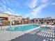 Community swimming pool and spa, providing a refreshing escape for residents at 4241 N Pebble Creek Pkwy # 42, Goodyear, AZ 85395