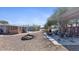 Spacious backyard with fire pit, exercise area, and plenty of room to roam at 606 E Baseline Rd, Buckeye, AZ 85326