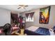 Cozy bedroom featuring two twin beds, ample closet space, and a comfortable living area at 606 E Baseline Rd, Buckeye, AZ 85326