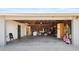 Open garage showcasing ample storage space, accessible interior view, and potential utility at 606 E Baseline Rd, Buckeye, AZ 85326