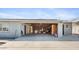 Spacious open garage offers versatile storage, interior access, and potential for various uses at 606 E Baseline Rd, Buckeye, AZ 85326
