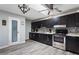 Updated kitchen featuring ample cabinetry, stainless steel appliances, and plenty of counter space at 606 E Baseline Rd, Buckeye, AZ 85326