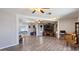 Spacious open concept living room featuring modern flooring and an abundance of natural light at 606 E Baseline Rd, Buckeye, AZ 85326