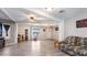 Bright living room with an open concept design and easy access to other areas of the home at 606 E Baseline Rd, Buckeye, AZ 85326