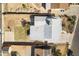 A top-down aerial view of the house with a new roof and fenced backyard at 7160 W Virginia Ave, Phoenix, AZ 85035
