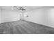 Large bedroom with carpet, a ceiling fan, and a window at 7160 W Virginia Ave, Phoenix, AZ 85035