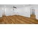 Open living area featuring wood flooring, recessed lighting, and ample space at 7160 W Virginia Ave, Phoenix, AZ 85035